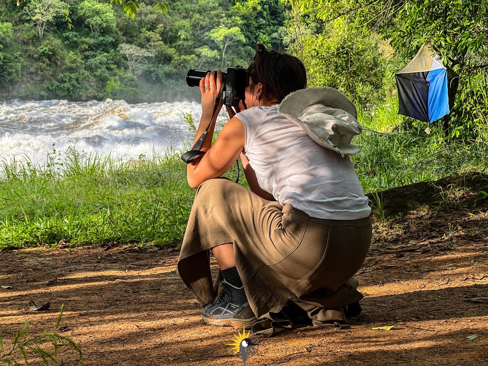 Tourist taking a picture at Murchison falls